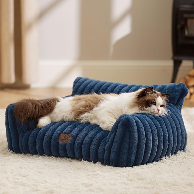Fluffy night blue washable cat couch bed with soft corduroy fleece for indoor pets.